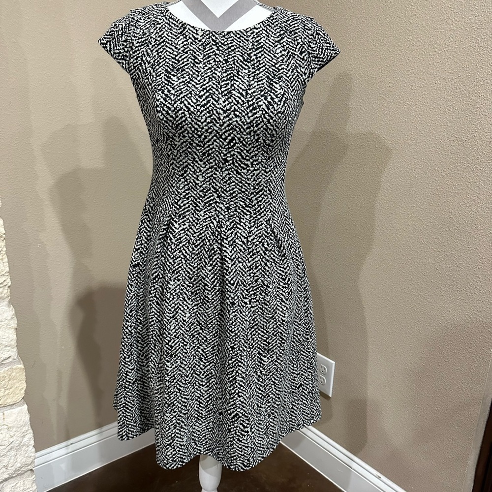 AB Studio dress in black and white with cap sleeves.